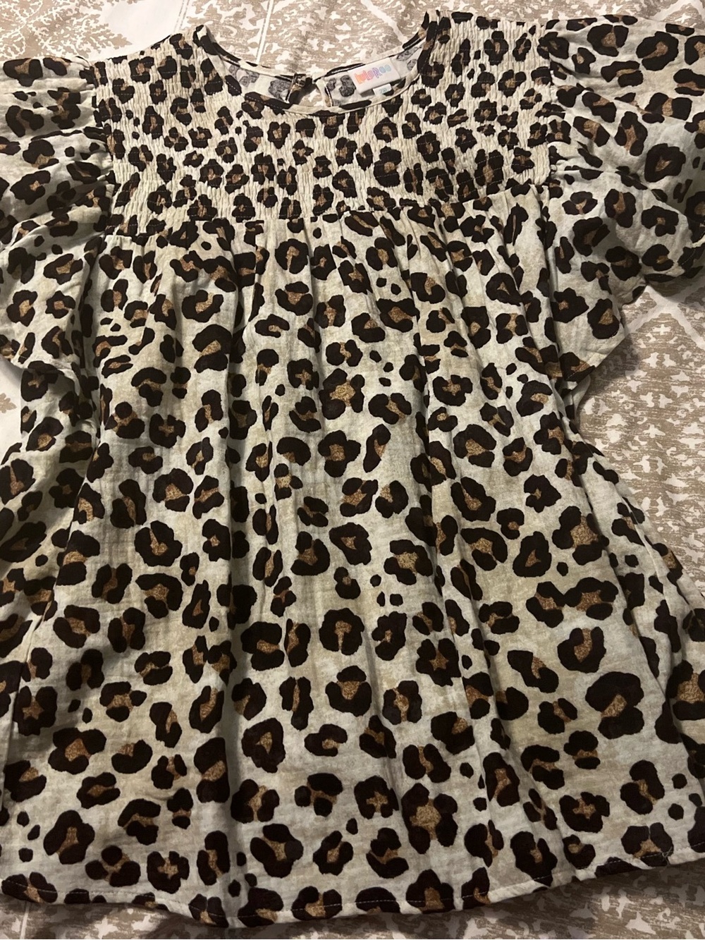 LuLaRoe Maddy - Leopard Print Smocked Yoke Blouse